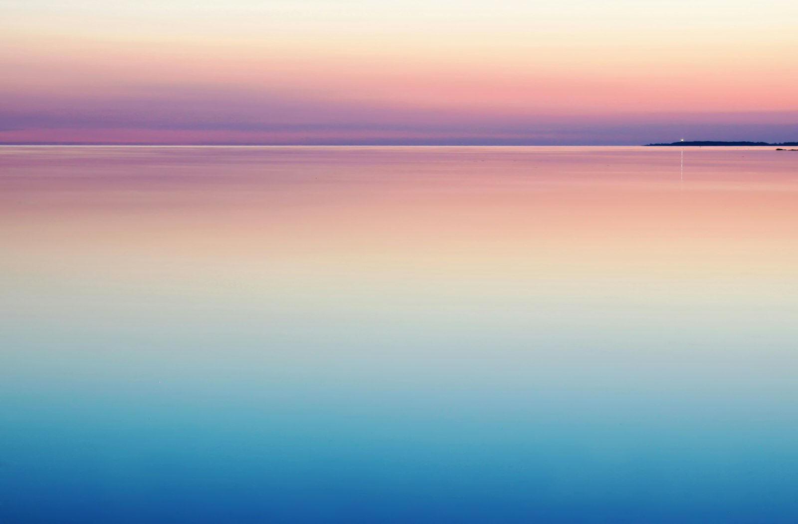 Blue and pink sea at dawn