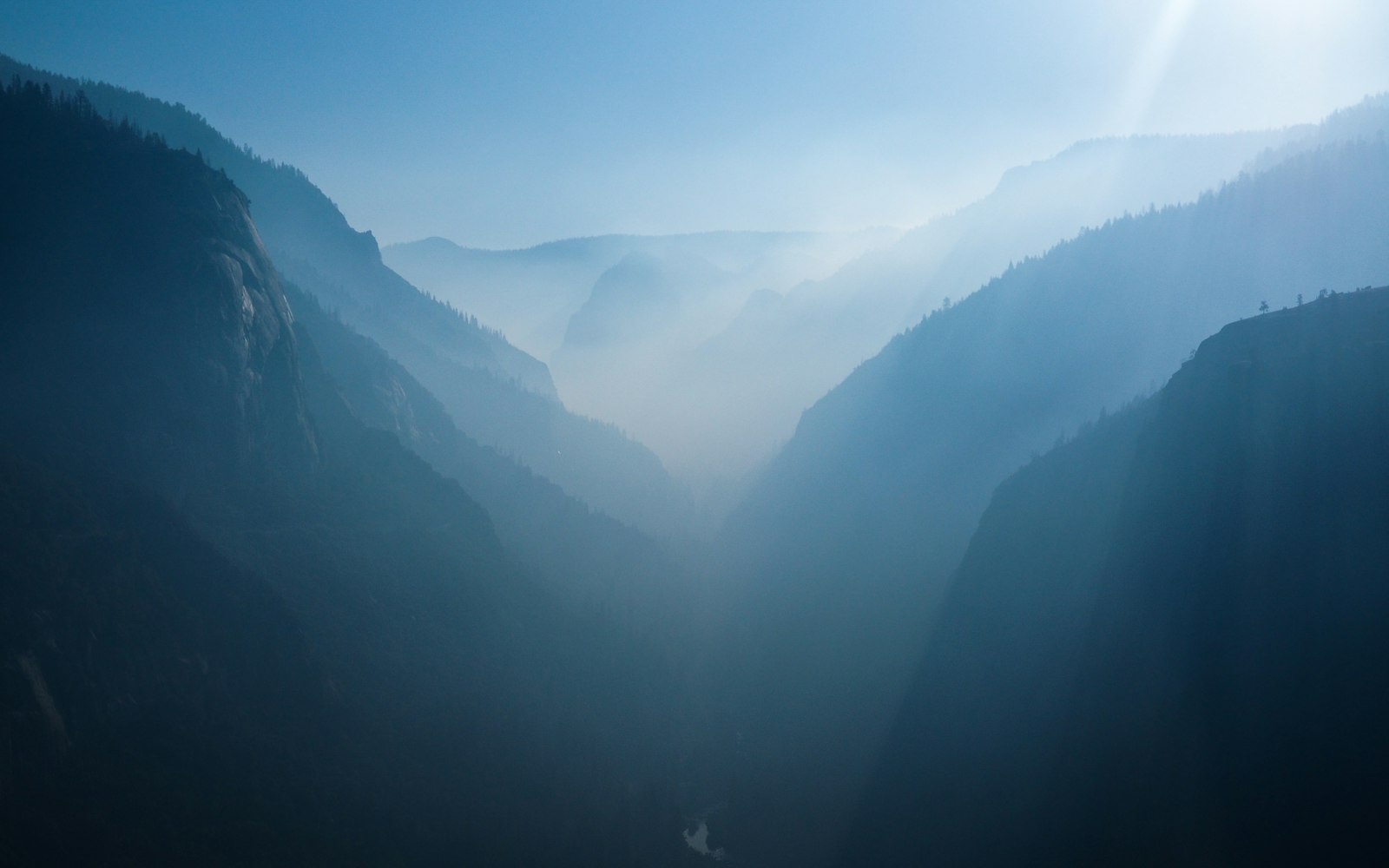 Aerial photo of mountains covered with mist