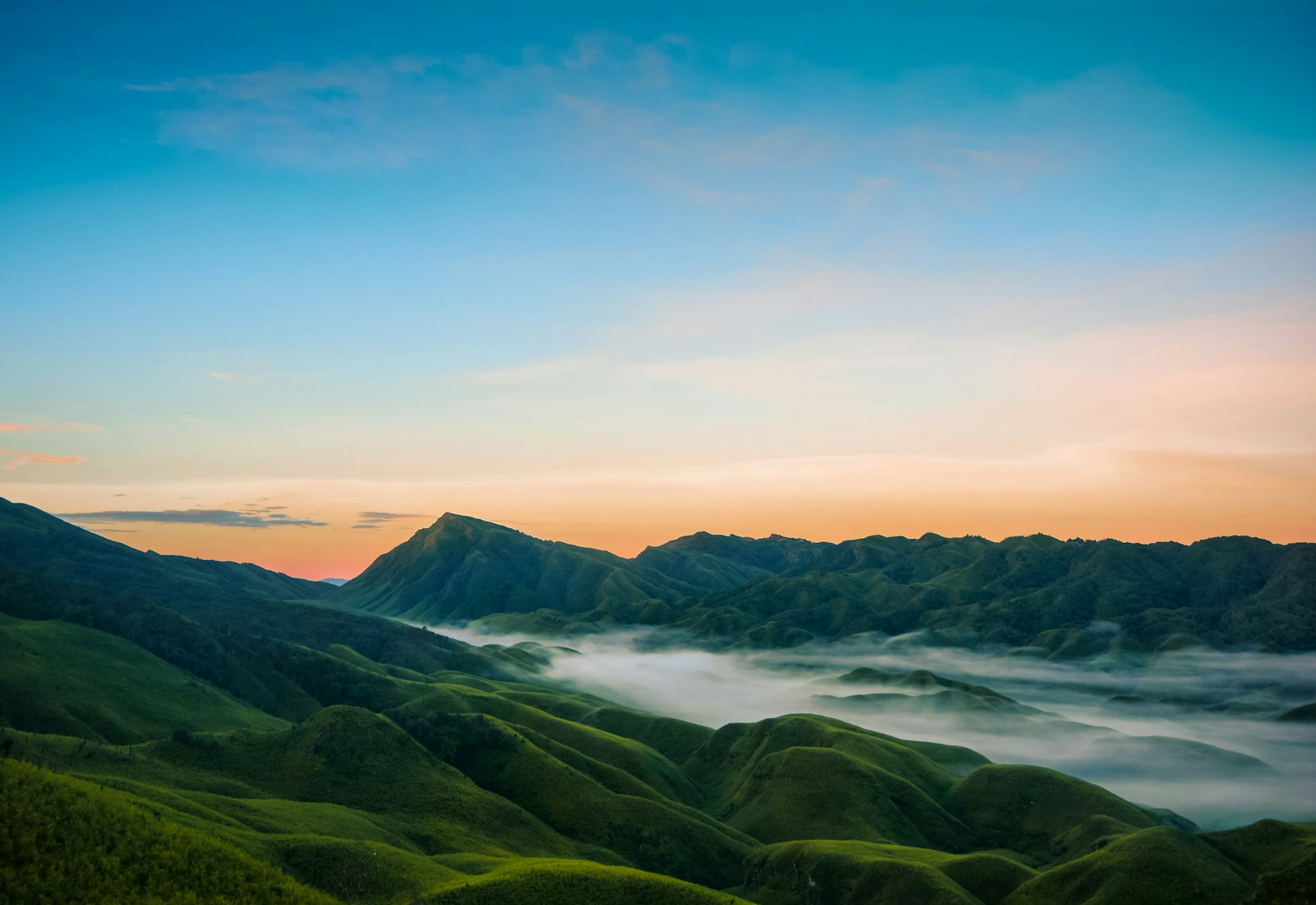 Mountains covered with fog