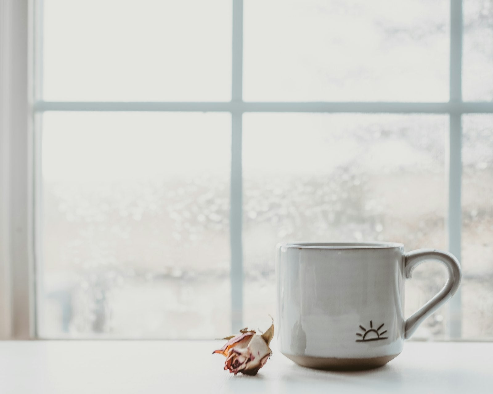 White ceramic mug on a white table