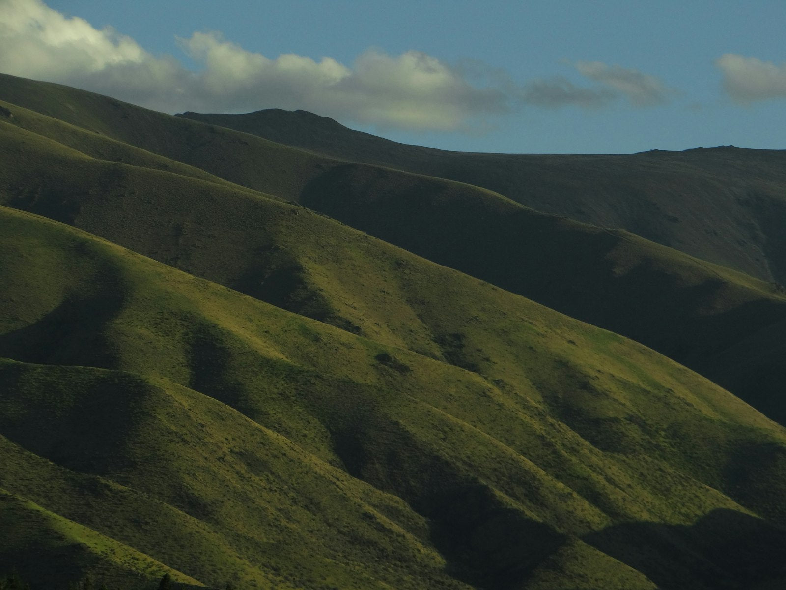 A green valley with hills